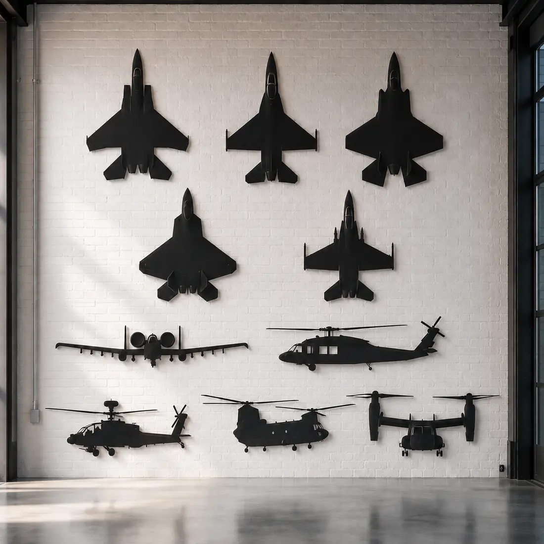 Afterburn Decals aircraft collection displayed on a white brick hangar wall
